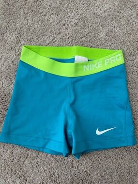 Nike Teal Athletic Shorts with Neon Green Waistband